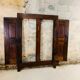 Portes anciennes en bois d'une armoire savoyarde chalet montagne vintage
