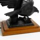 1940s table lamp made of iron in the shape of an eagle, teak wooden base