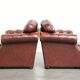 Vintage set of 2 cowhide leather Chesterfield armchairs in a brown colour