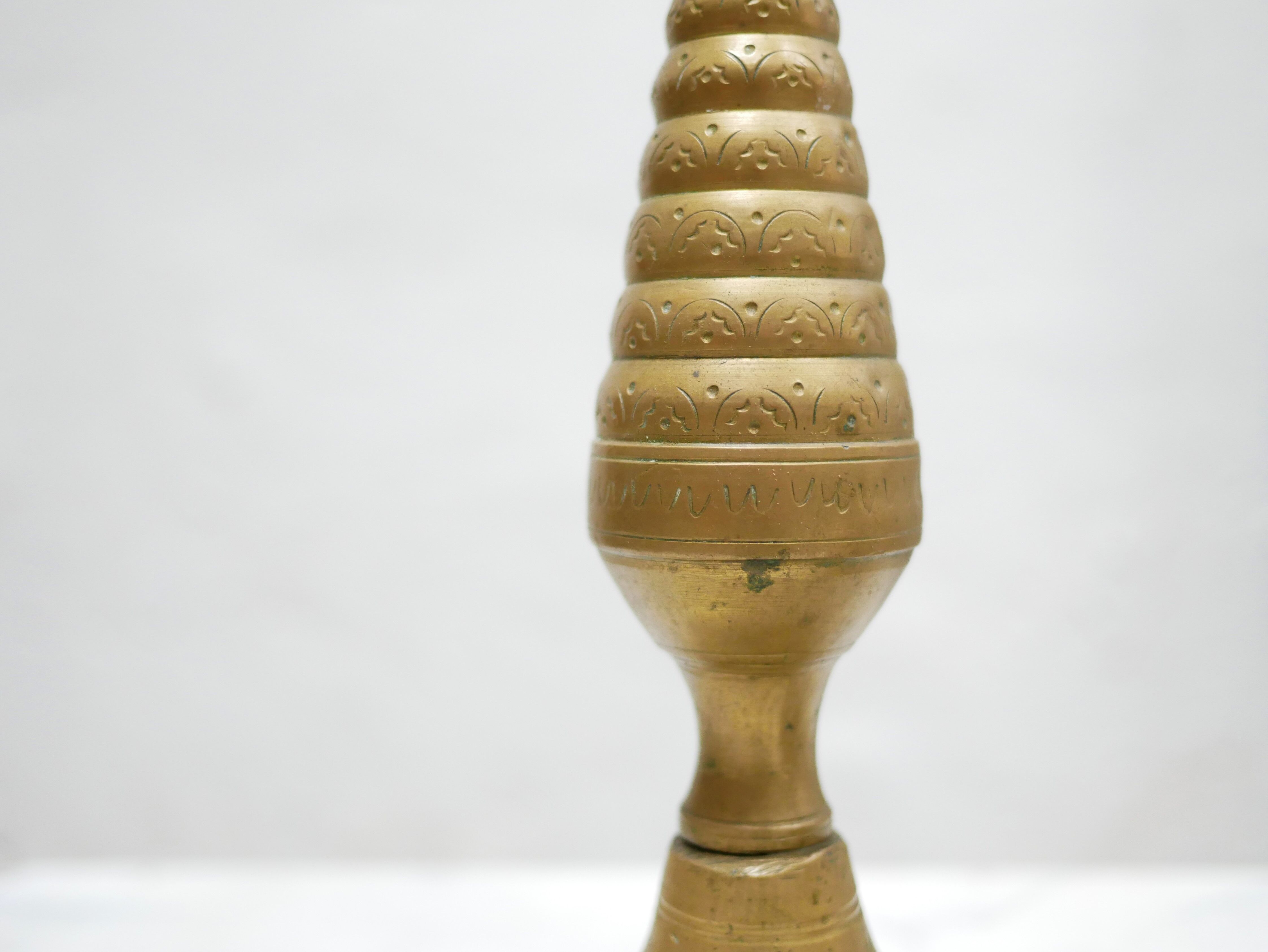 Pair of vintage candle holders in golden brass