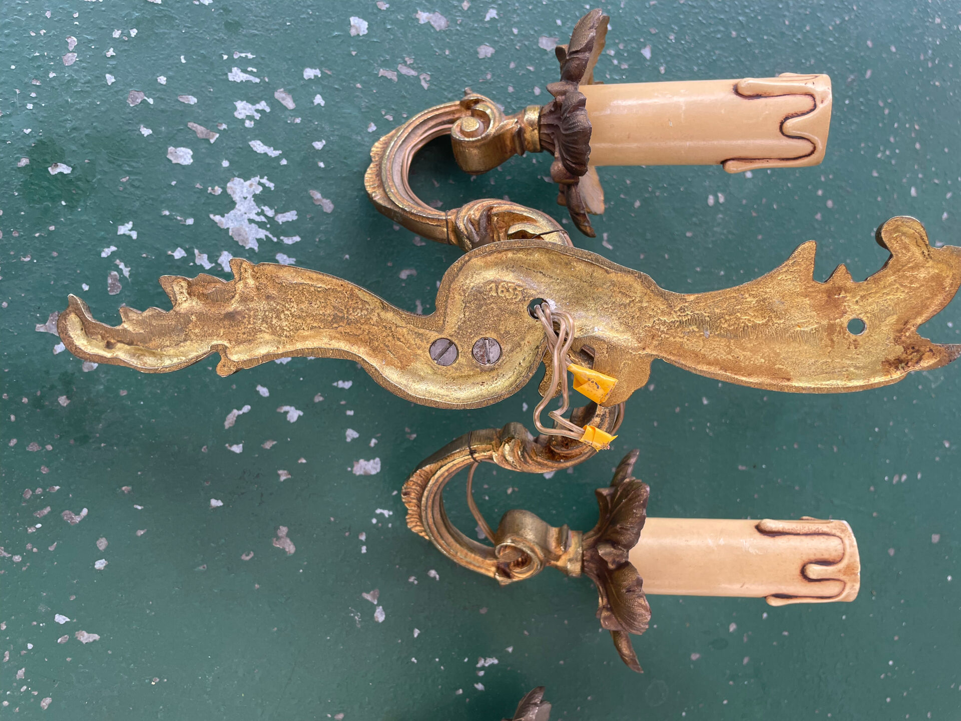 Pair of bronze Art Nouveau wall sconces.