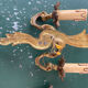 Pair of bronze Art Nouveau wall sconces.