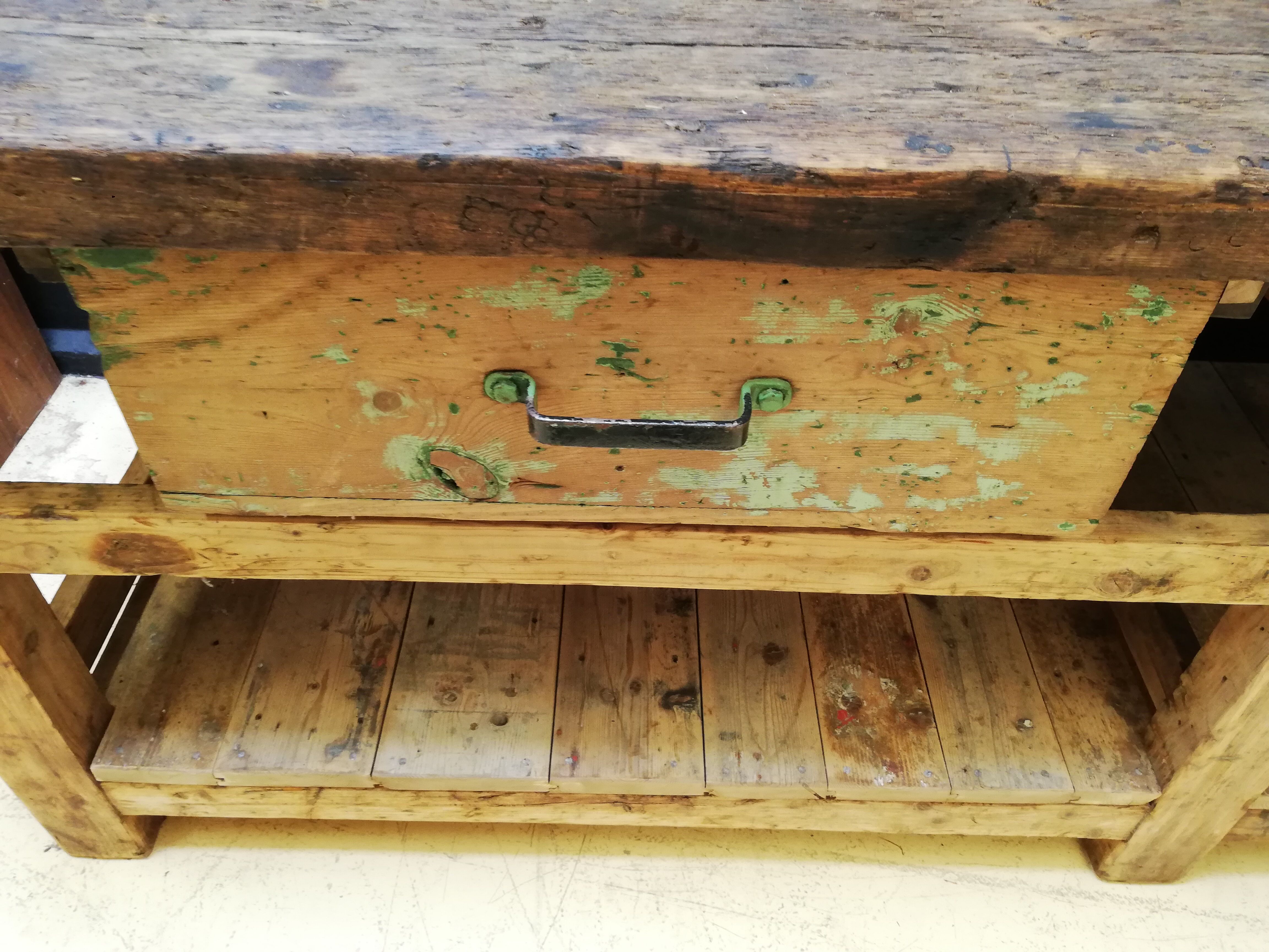 Old vintage wooden carpenter's workbench, industrial decoration