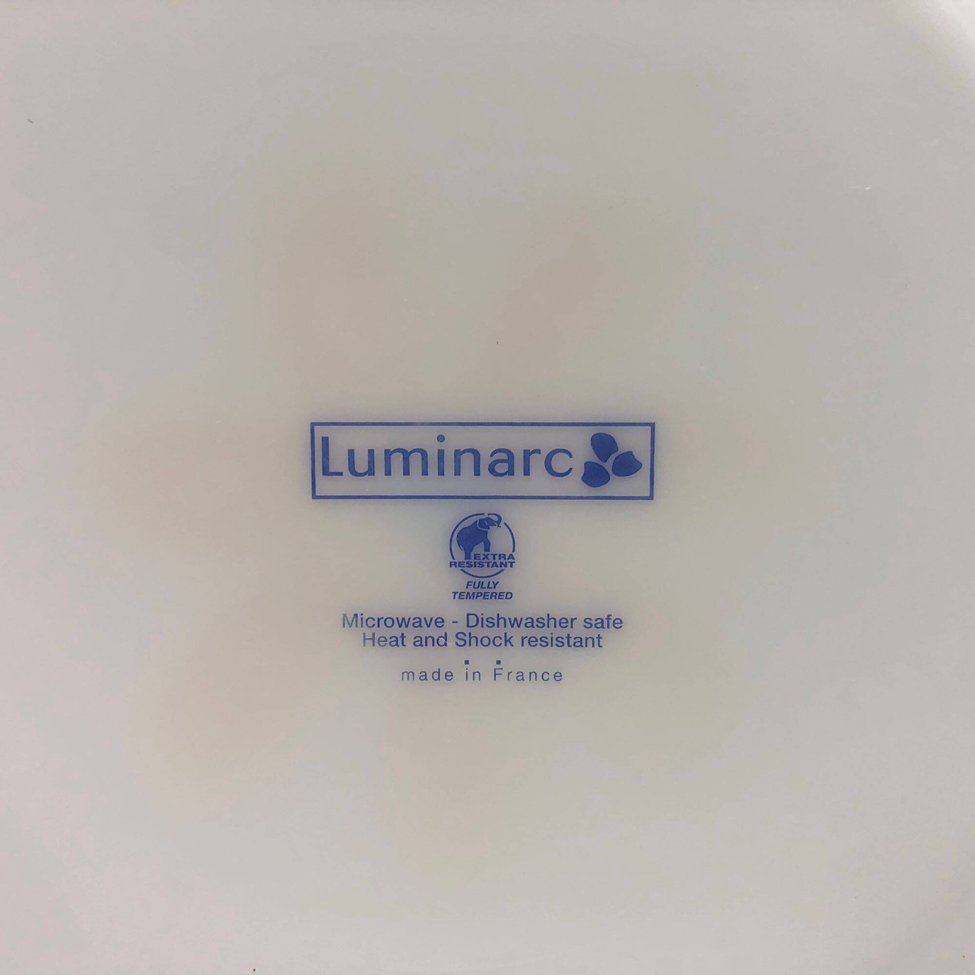 6 hollow plates "luminarc" with flower motifs.