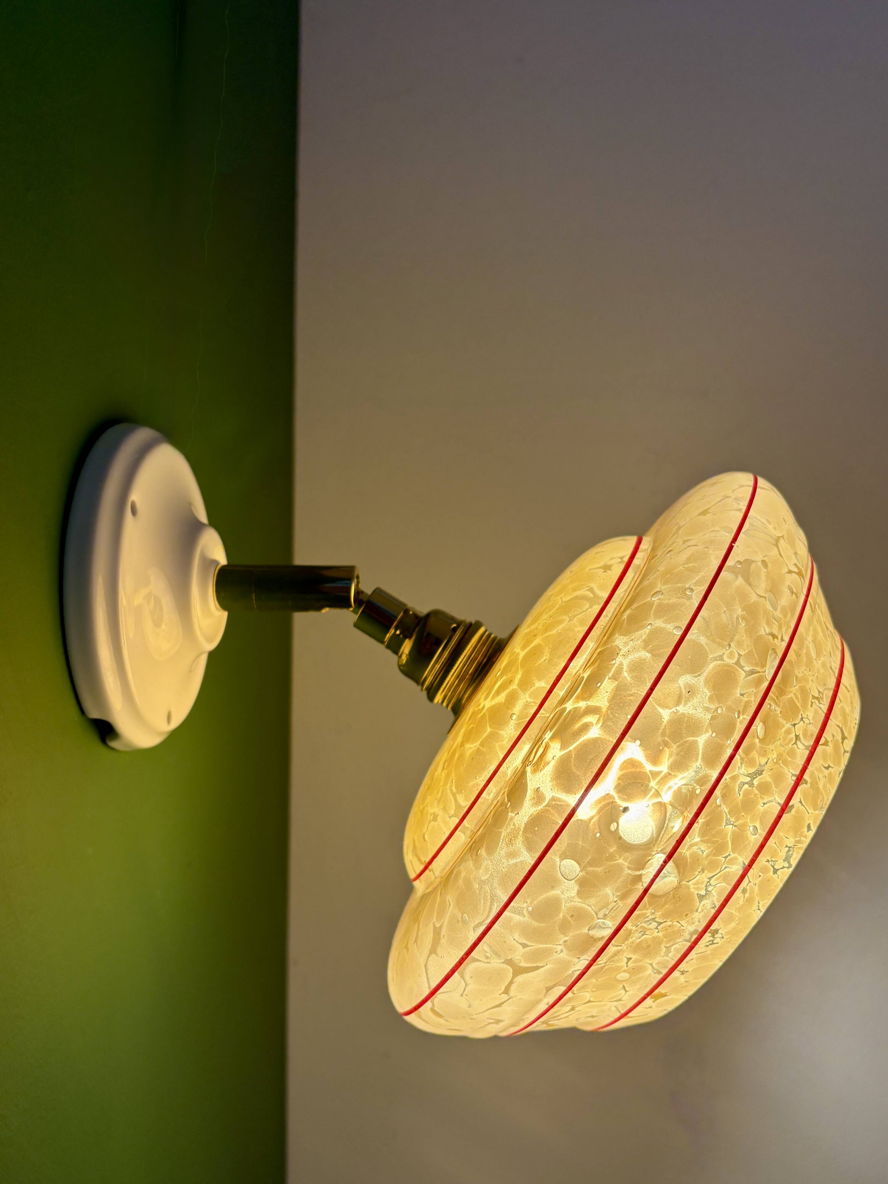 Vintage wall lamp with yellow clichy glass shade and red trim