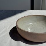 A speckled grey interior bowl with a matte brown exterior H5 D15