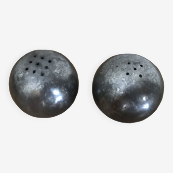 Brutalist salt and pepper ball in cast steel