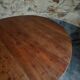 Antique round dining table in cherry wood, France, circa 1920.