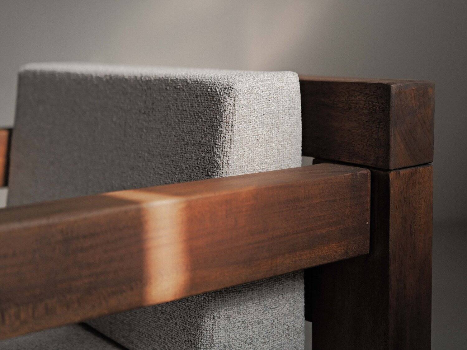 Handcrafted armchair in solid wood and fabric, 1980s-90s.