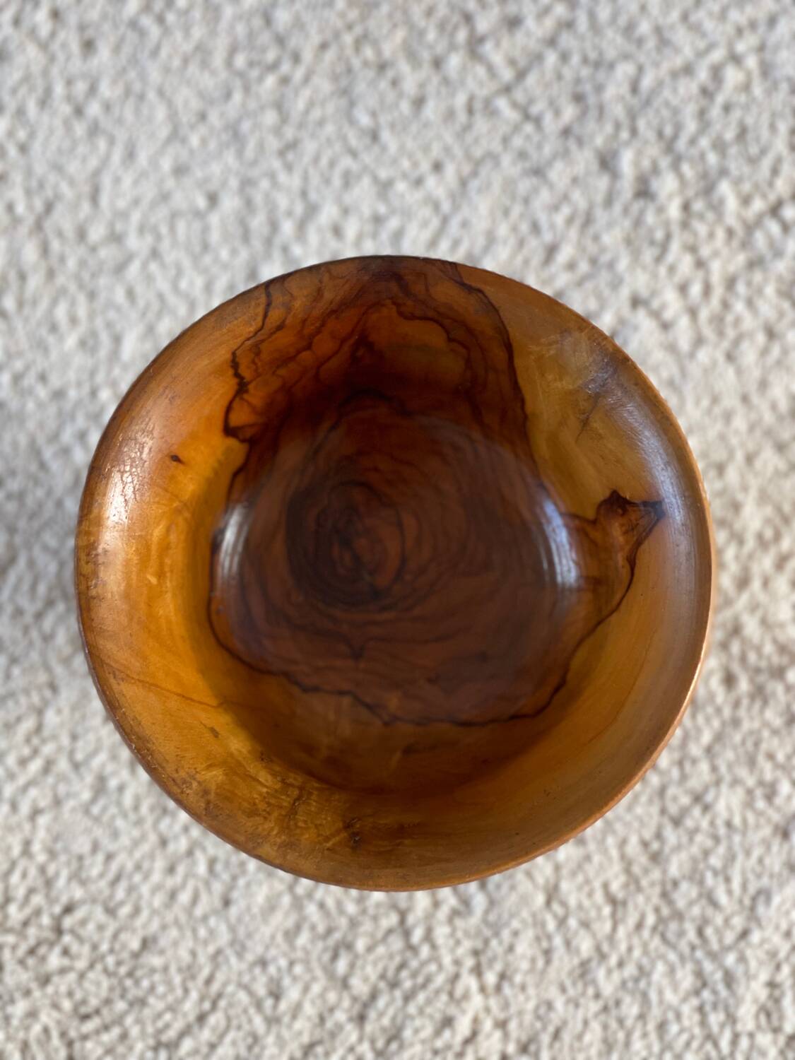 Empty pocket in olive wood
