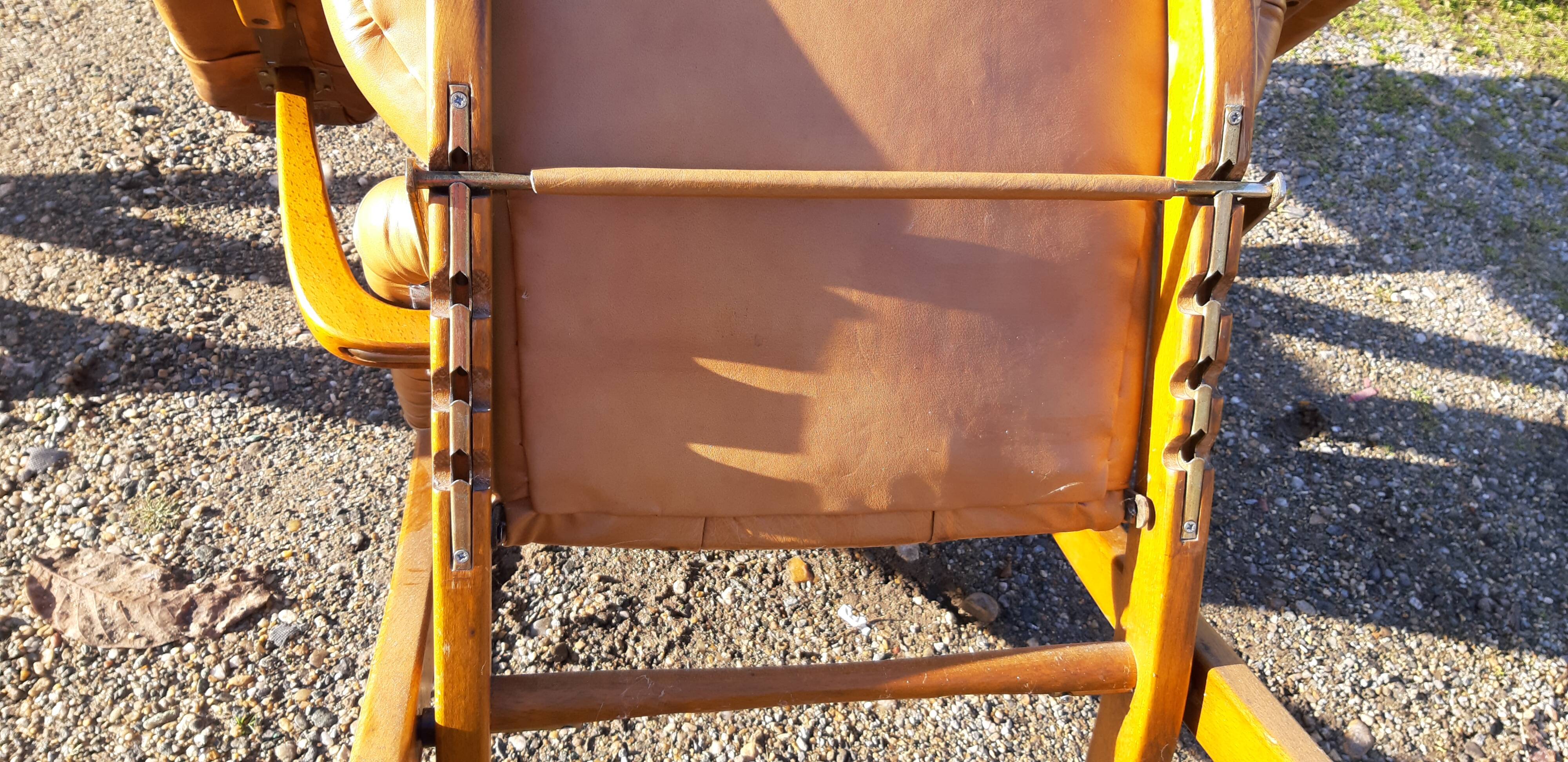 Pair of chesterfield style leather armchairs