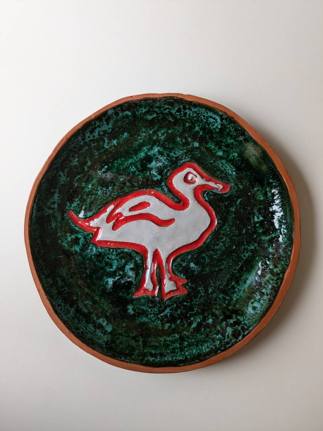 Decorative ceramic plate with duck decoration