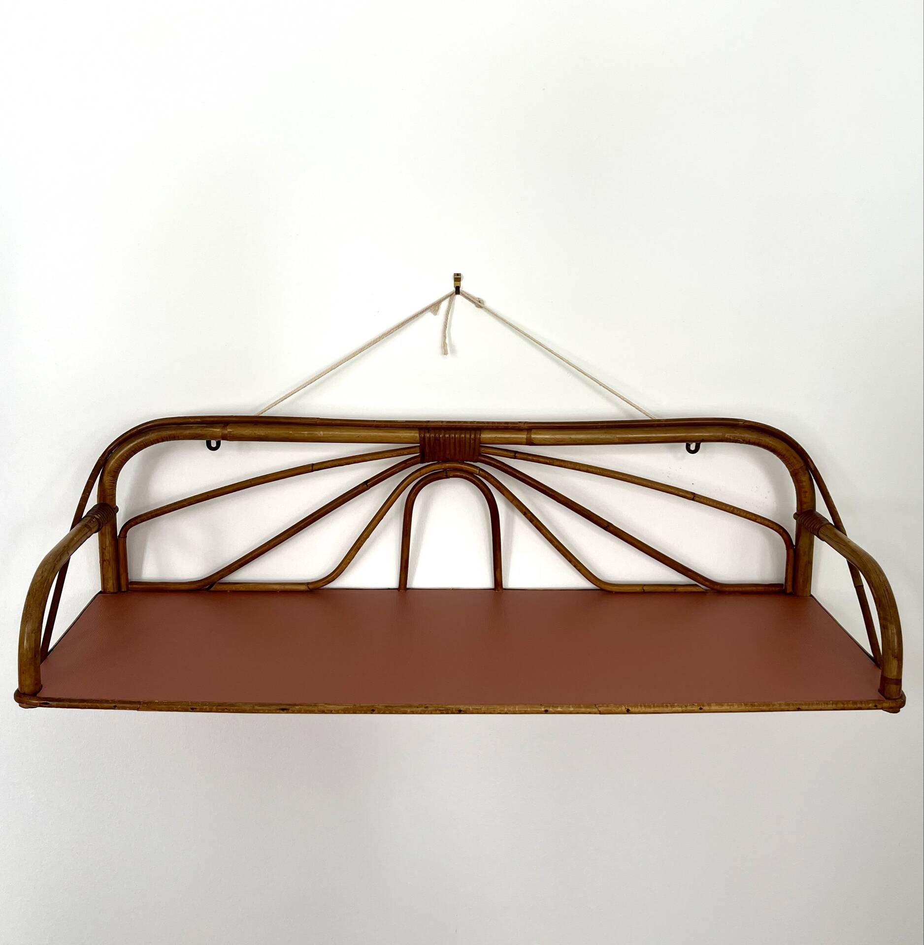 1960s rattan shelf with terracotta top