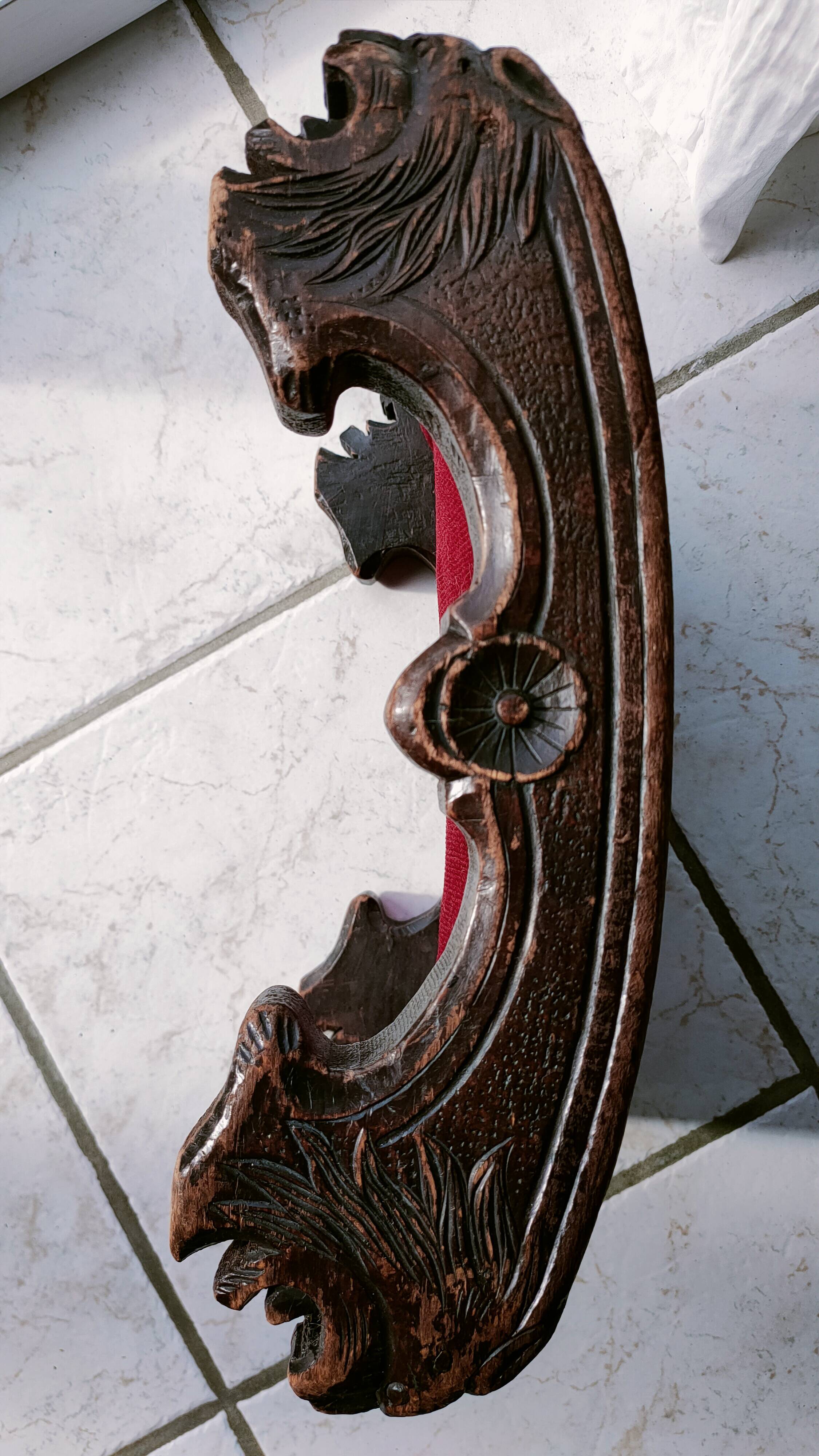 Red velvet footrest or prie-dieu