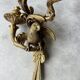 Pair of bronze wall sconces with parrots, early 20th century.