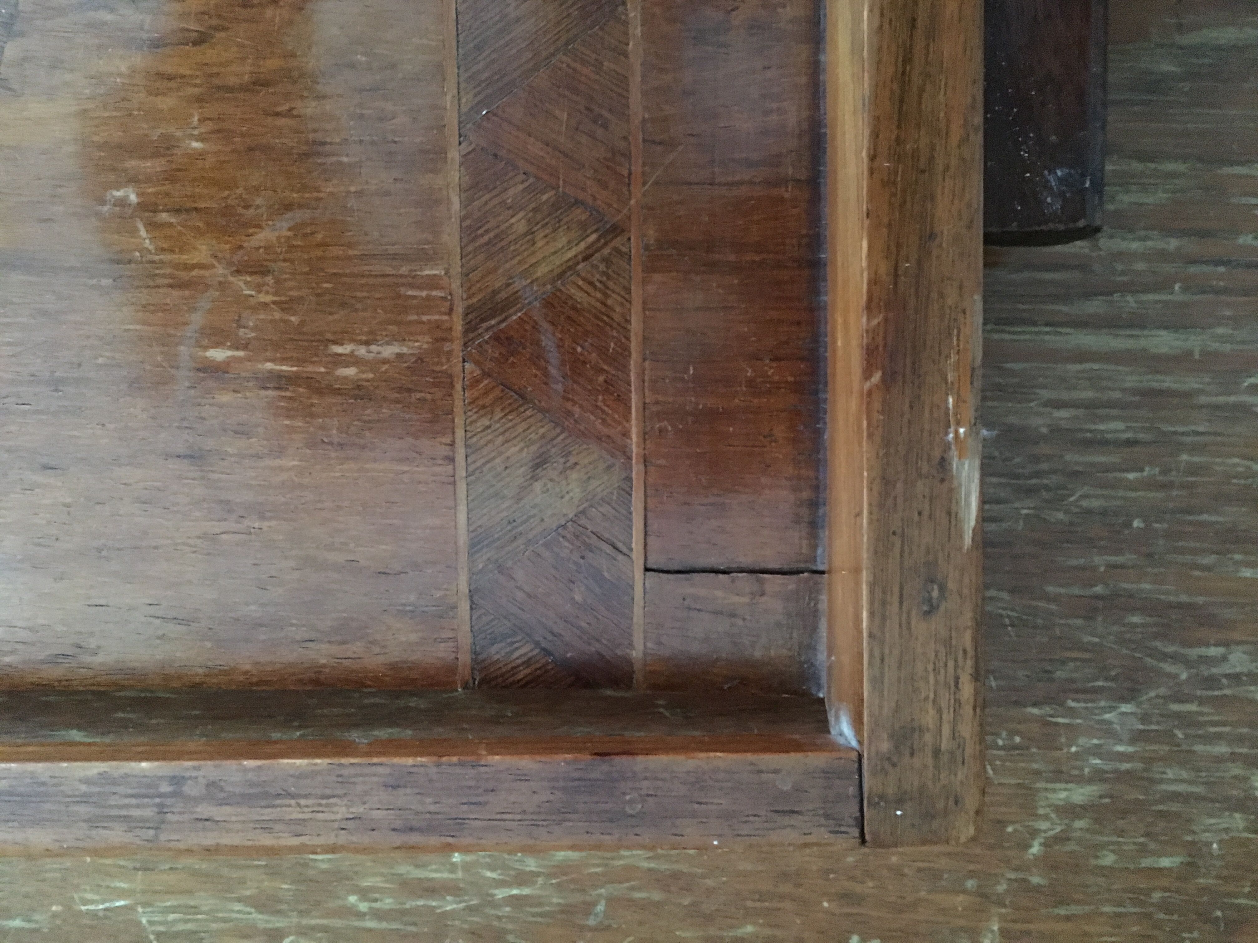Old wooden serving tray with marquetry drawing