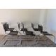 Series of 6 minimalist chairs in chrome metal and black leather around 1970