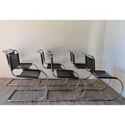 Series of 6 minimalist chairs in chrome metal and black leather around 1970