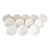 Lot de 12 assiettes à dessert en porcelaine de Limoges décor floral doré