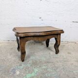 Antique footstool with rustic charm