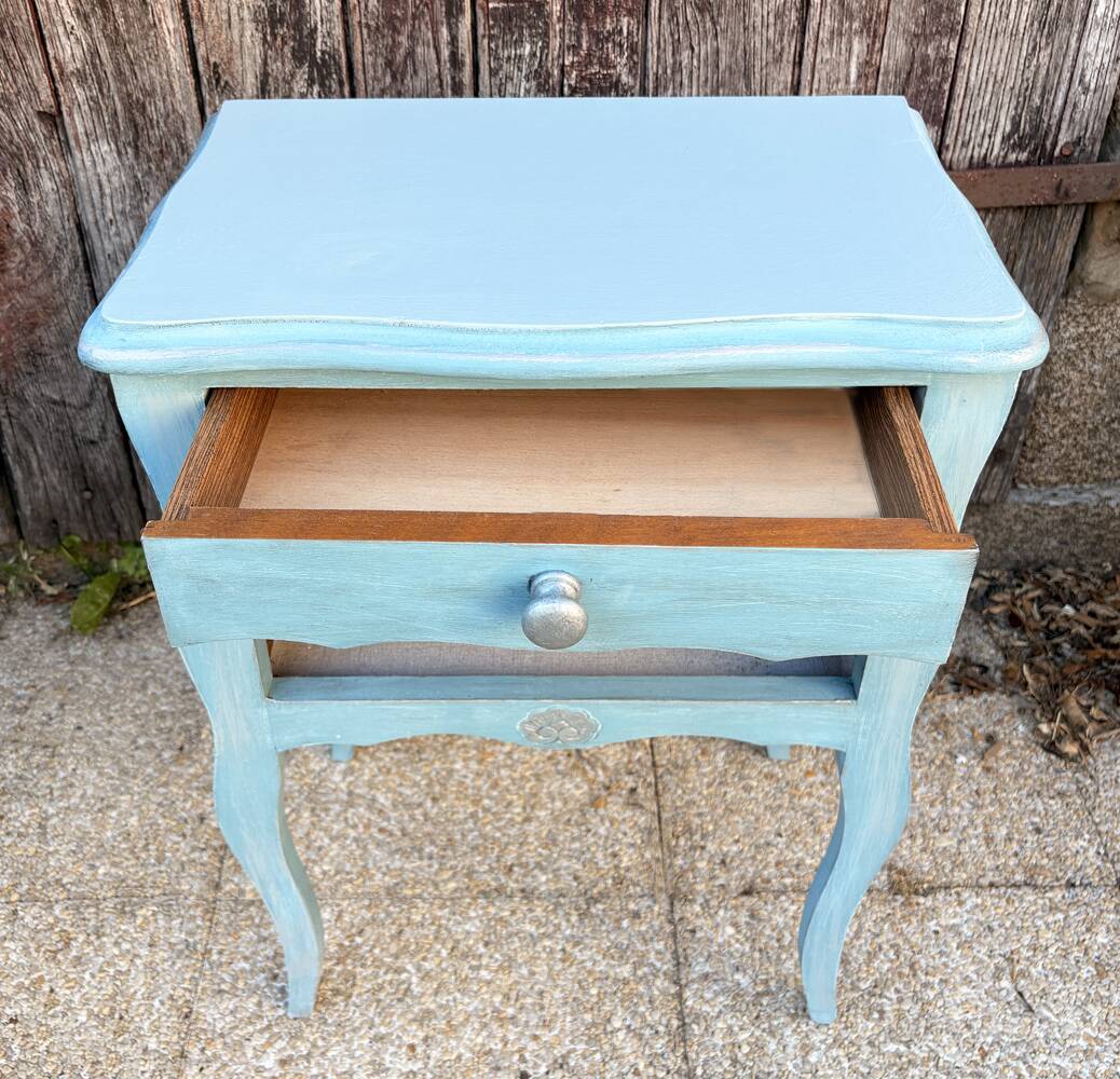 Pair of patinated lagoon blue bedside tables, early 20th century, with curved legs.
