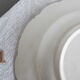 4 assiettes semi creuses terre de fer Longchamp