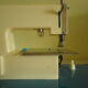 Electric motor for year 1950 child sewing machine