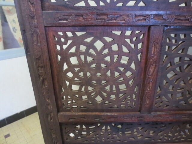 Former screen in treated exotic wood