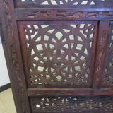 Former screen in treated exotic wood