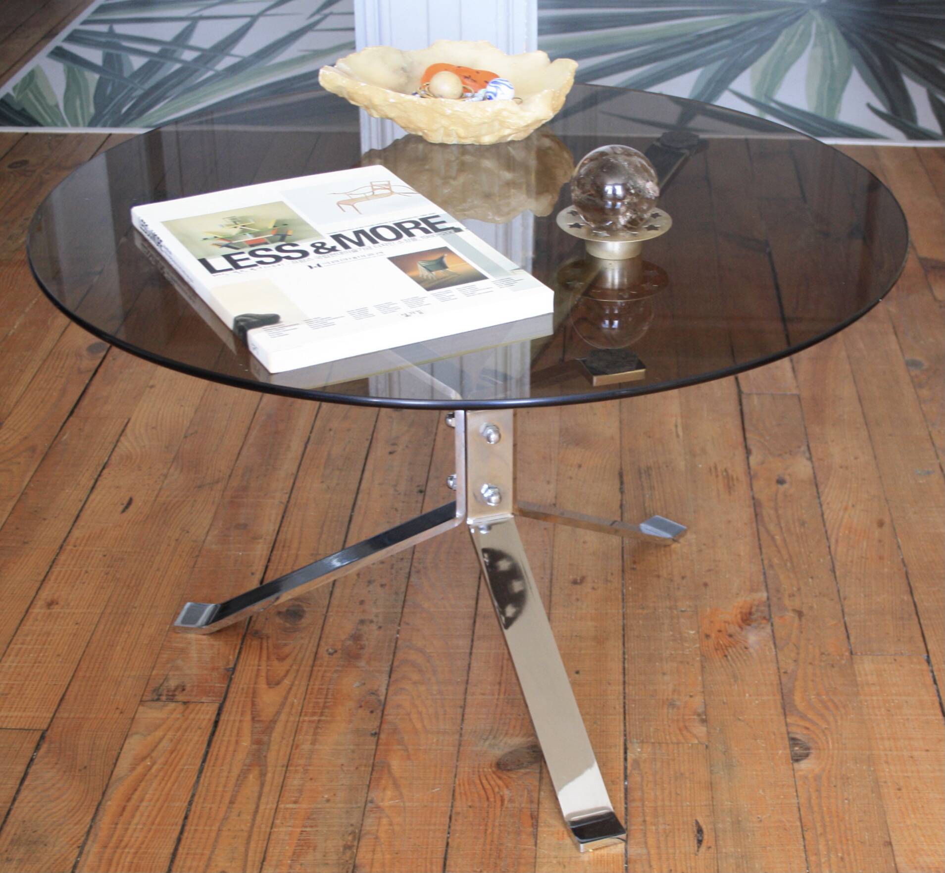 Round coffee table in smoked glass and chrome