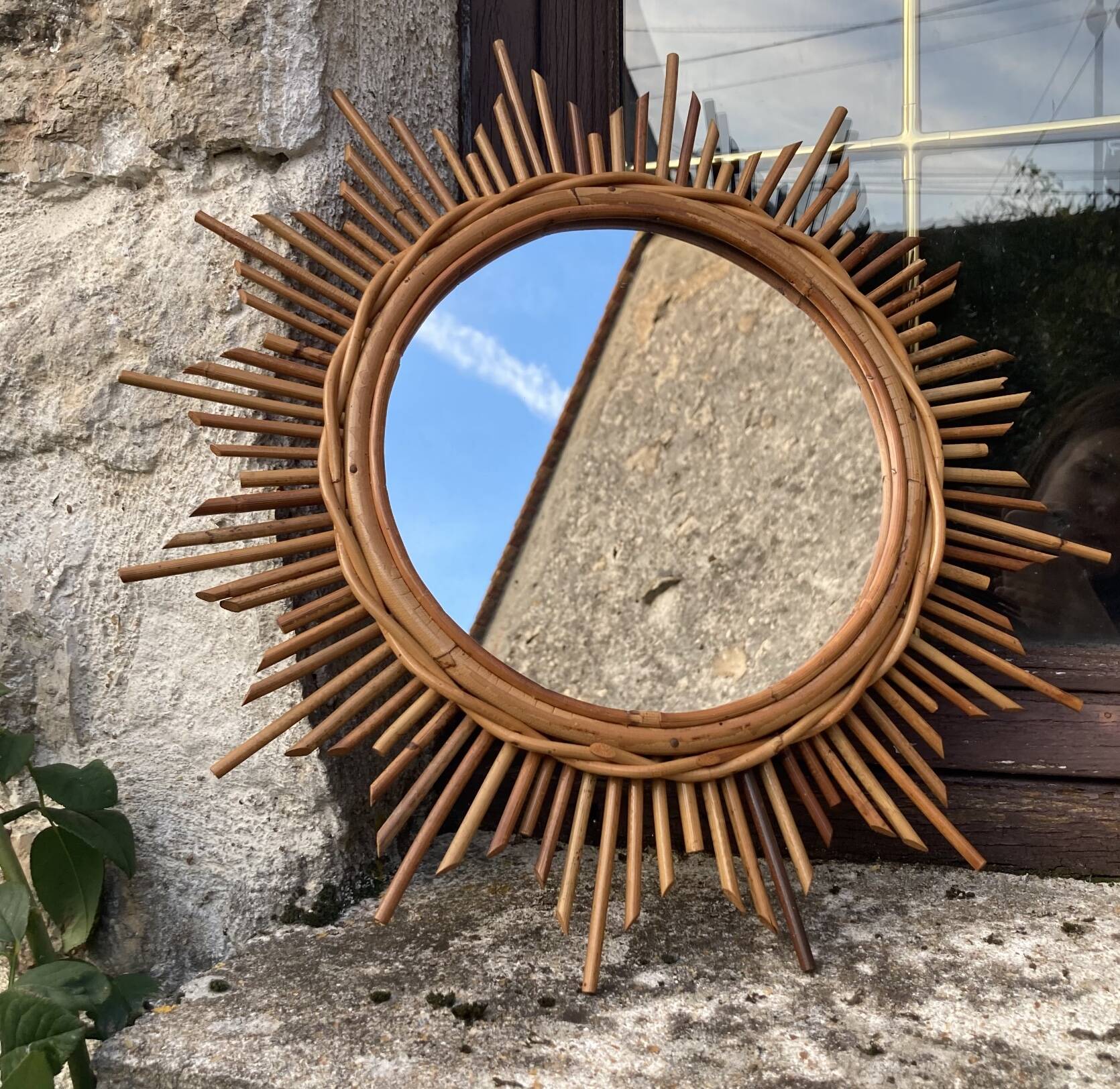 Vintage rattan sun mirror