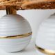 Pair of vintage table lamps – white metal with rattan shades, gold details, Italy 1980s
