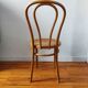 Chaise bistrot ancienne en bois blond courbé et cannage