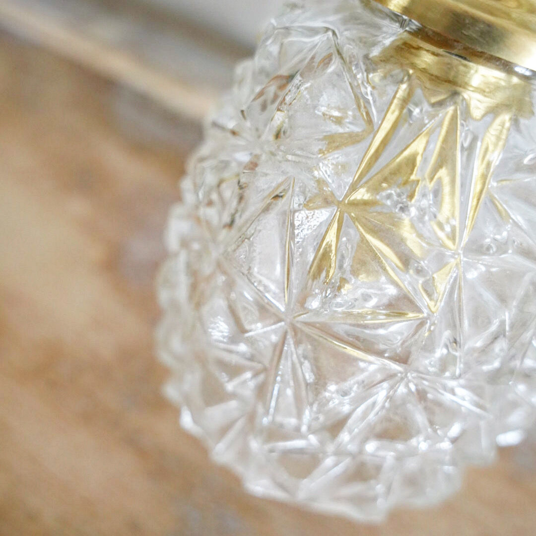 Carved glass wall lamp