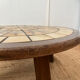 Round coffee table in ceramic and wood in the style of Roger Capron.