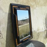 Miroir flamand a cadre ondulé