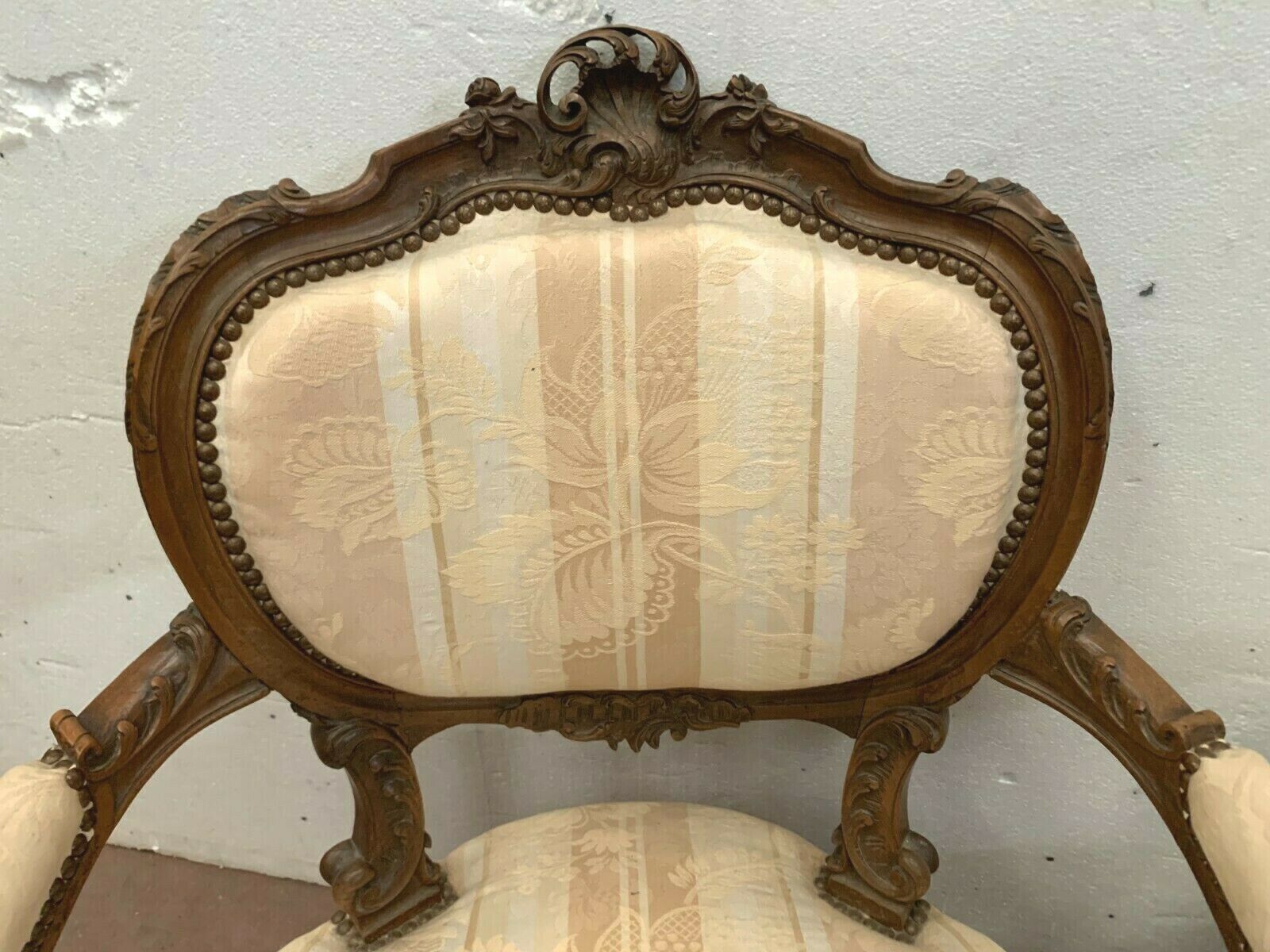 Pair of 20th century walnut rock armchairs