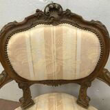 Paire de fauteuils rocaille en noyer XXe siècle