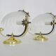 Pair of shell wall lights in glass and gold-plated metal. 1980s