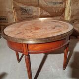 Marble and cherry hot water bottle table