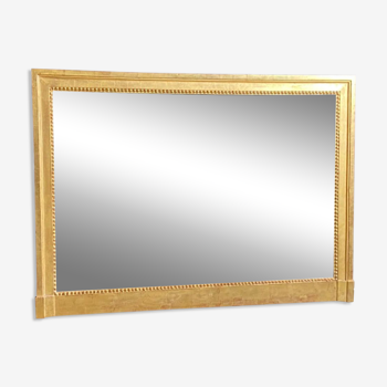 Miroir rectangulaire de style Louis XVI en bois doré