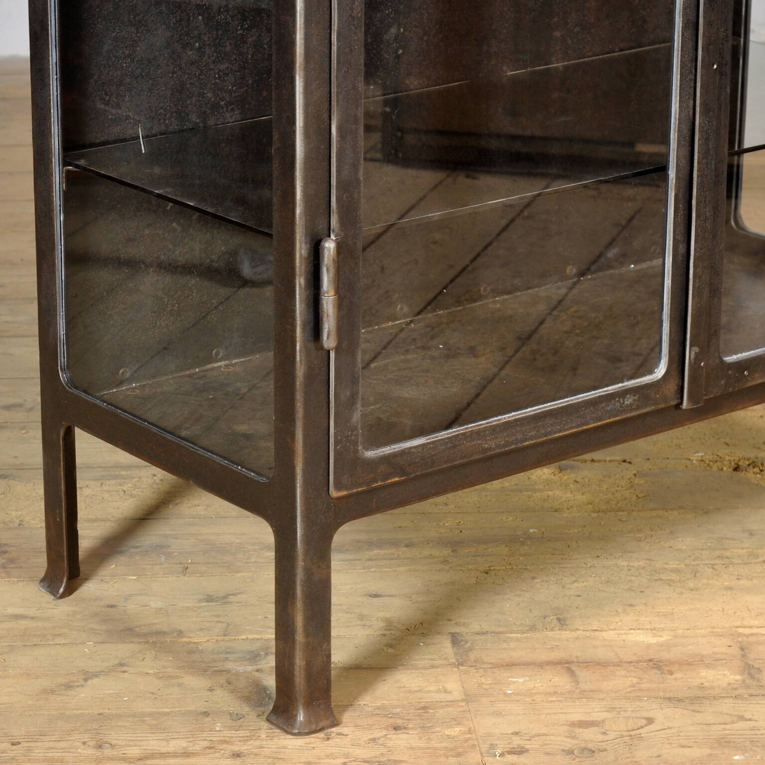 Polished iron medical cabinet, 1930s