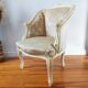 Fauteuil ancien bergère style Louis XV patiné