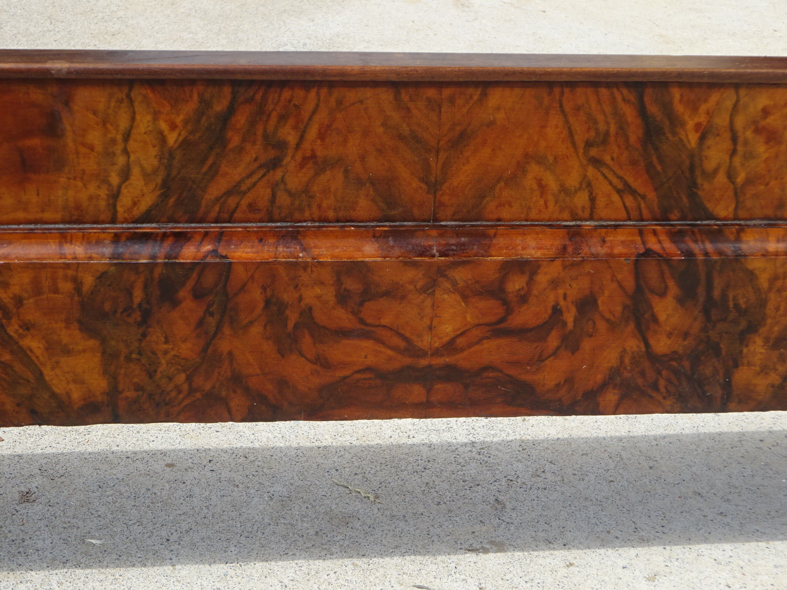 Walnut bed and walnut magnifying glass nineteenth century