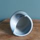 Vase Virebent porcelain cylindrical roll shape with a deep neck.
