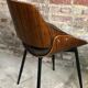 Scandinavian style chairs in curved plywood covered with brown fabric
