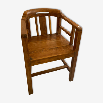 Old teak theater chair