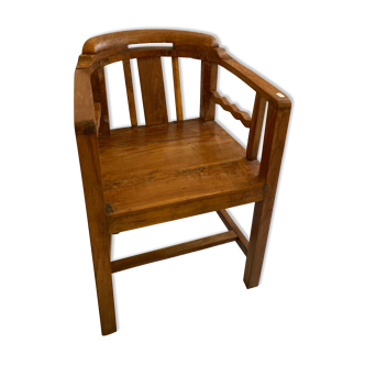 Old teak theater chair