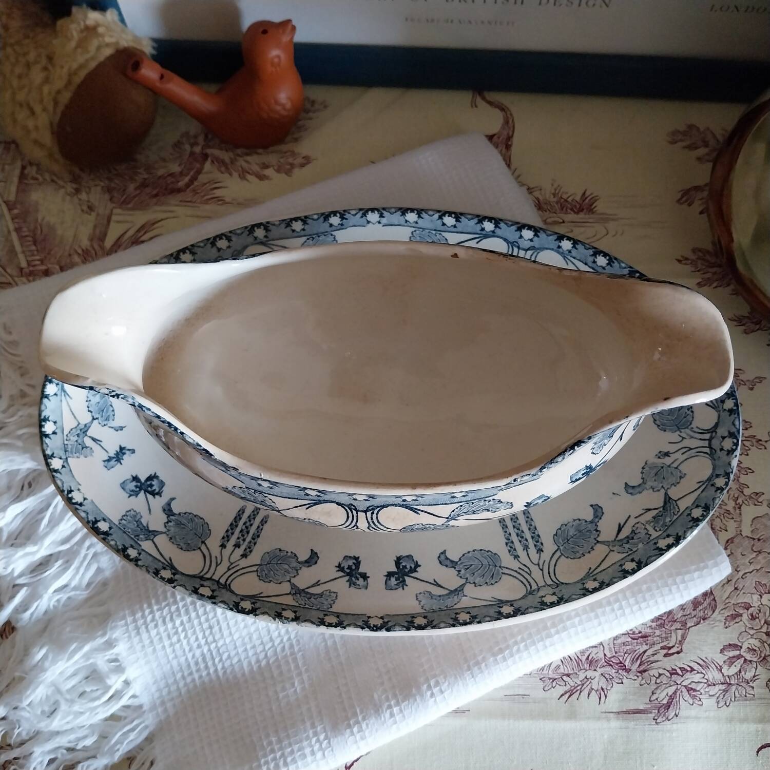 Ancienne saucière terre de fer Sarreguemines U&C