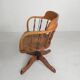 Oak office chair with a spring system and height adjustable, 1930s.